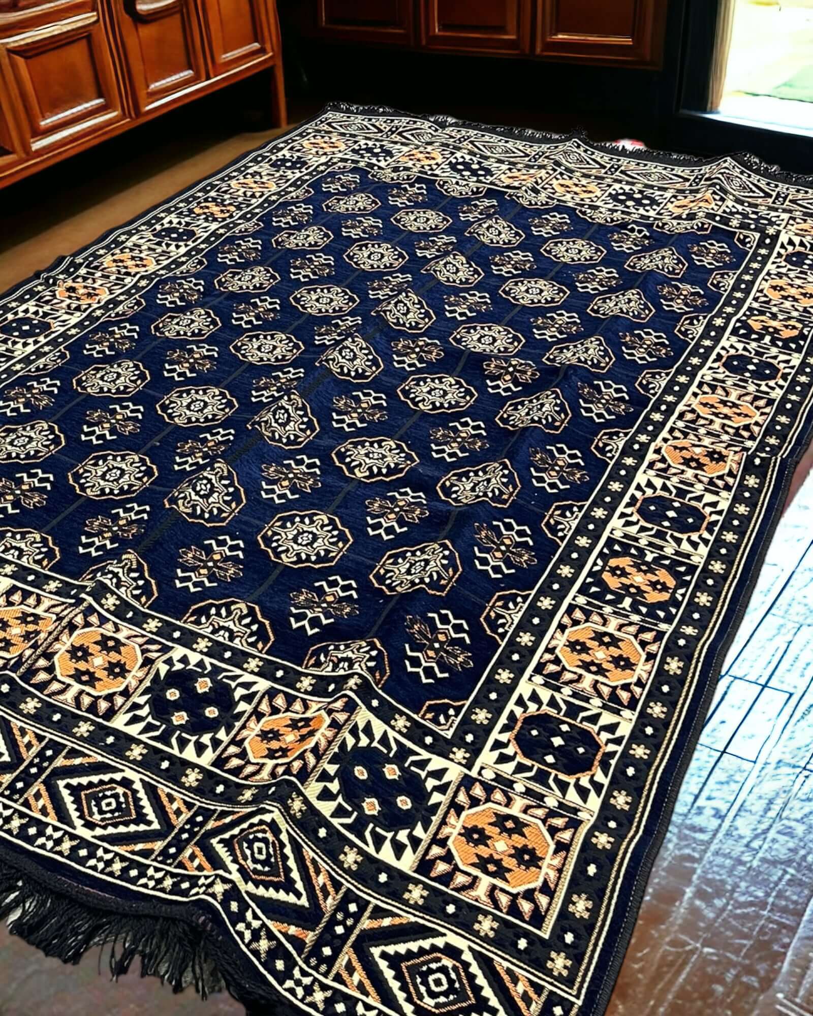 Turkish Kilim Rug (Majlis Navy)-the perfect match for your divan set and floor cushions. Crafted from 100% cotton in Turkey, this rug seamlessly complements your living space with its captivating geometric pattern and practical design. Not only does the A