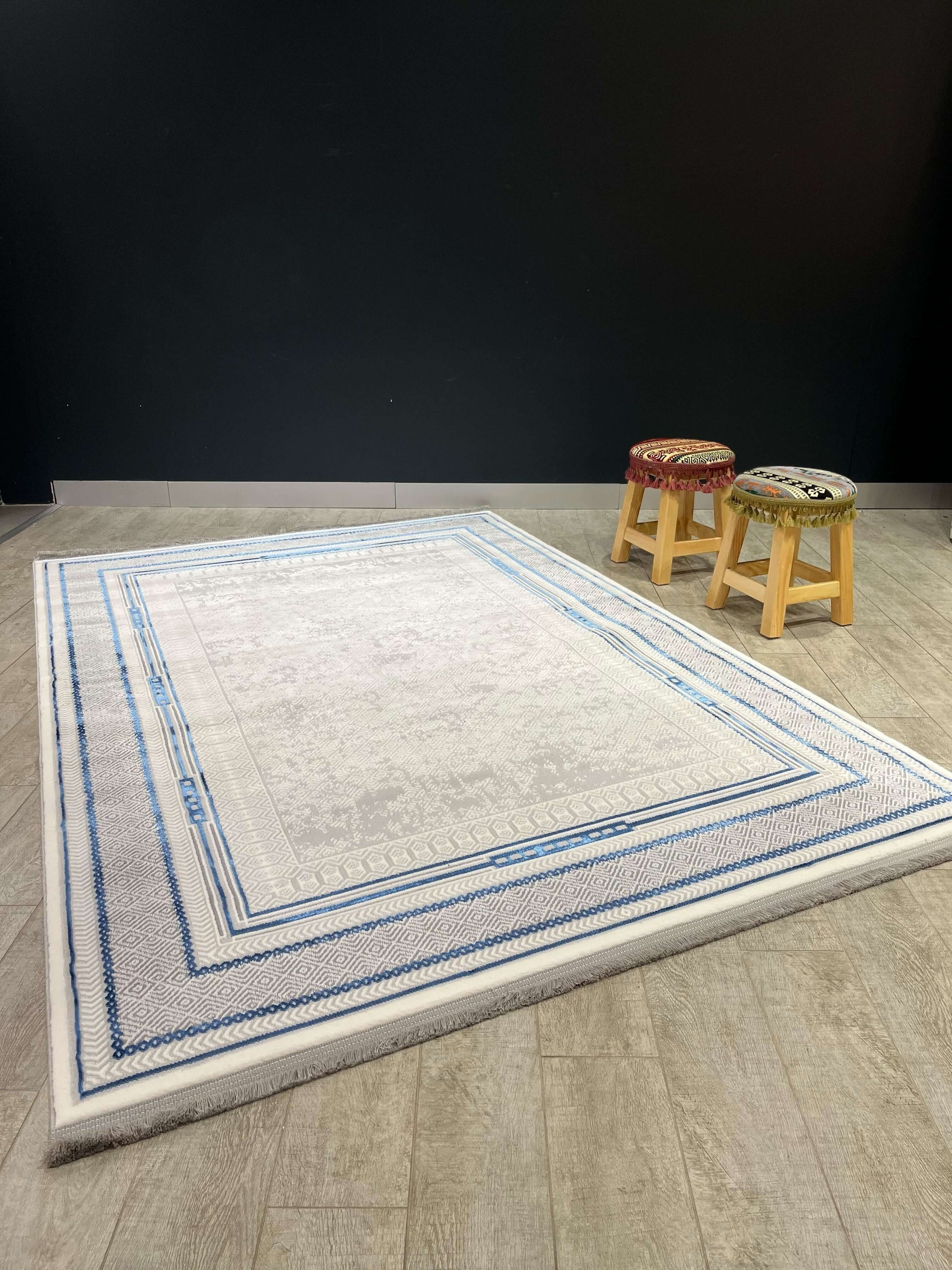 Asaryun Turkish Rugs Bazaar G-Discover the perfect blend of tradition and modernity with our Turkish polyester rug. Featuring a rich blue background with intricate patterns, this durable, easy-to-maintain rug adds elegance to any space. Ideal for high-tra