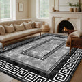 Monochrome Greek Key Border Turkish Rug showcased in a bright living room, enhancing the space with elegance.