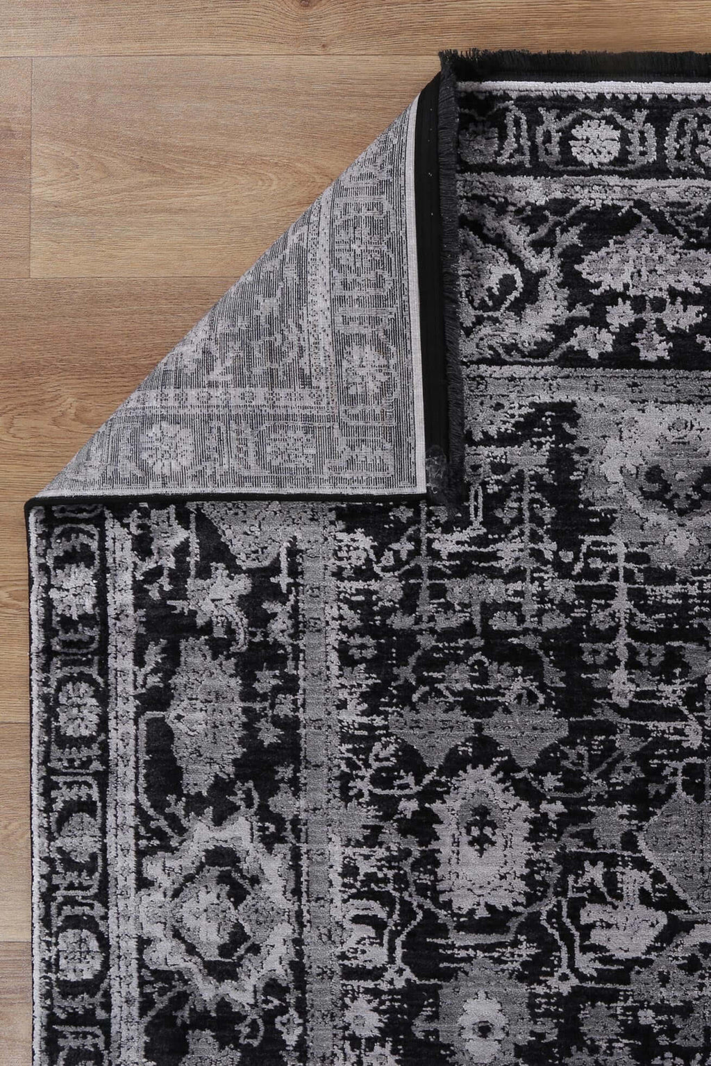 Turkish Rug in Silver & Black from the Brooklyn Collection, showcasing elegant design and soft texture.