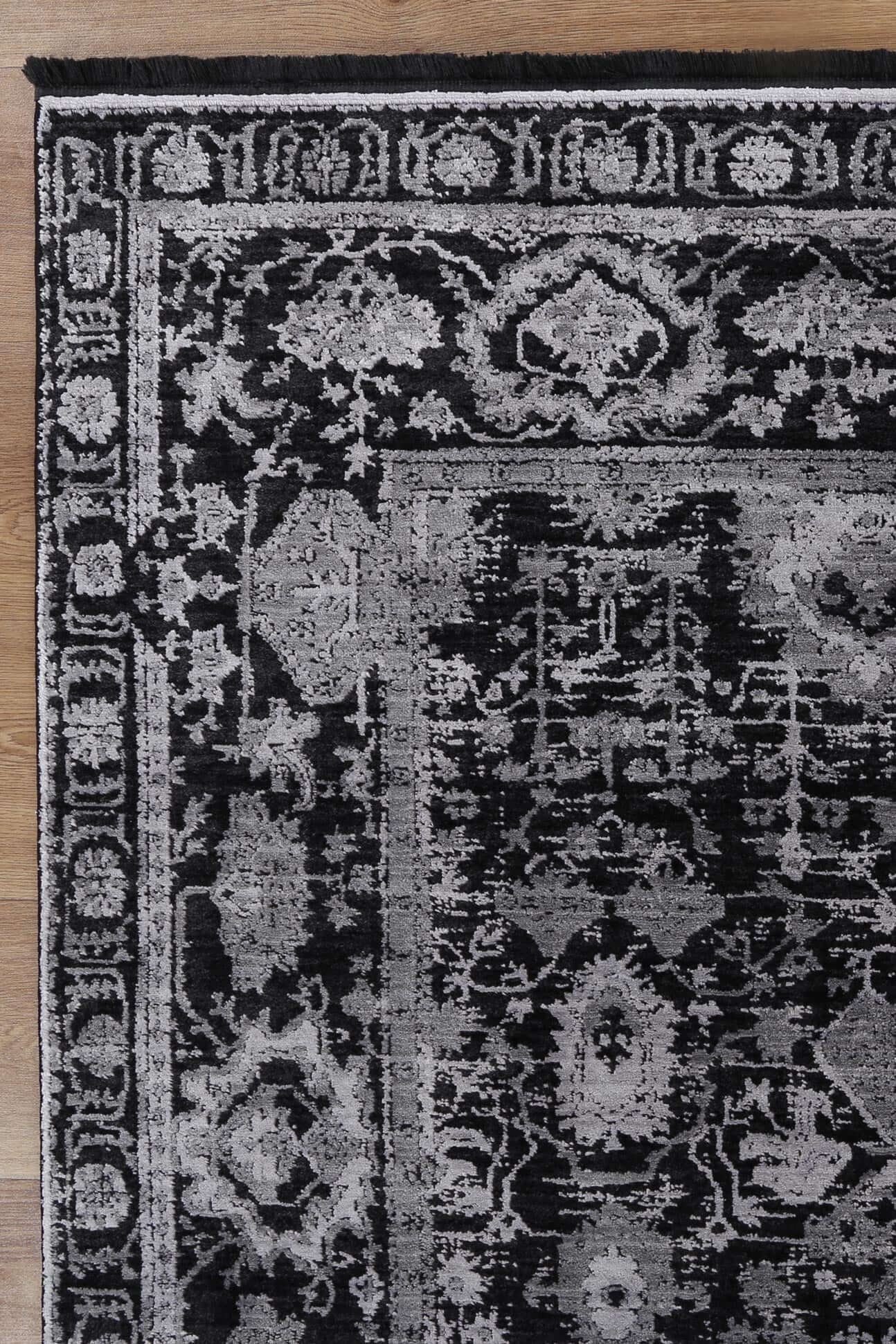 Turkish Rug in Silver & Black from the Brooklyn Collection showcasing intricate patterns and elegant low-pile design.