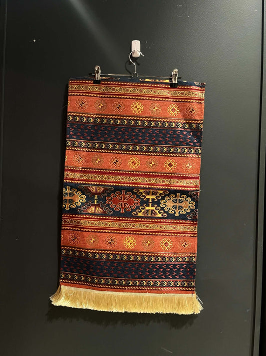 Turkish Table Runner Aztec Orange-Crafted from acrylic featuring a captivating blend of Tulip and Aztec designs, this table runner effortlessly adds a touch of cultural richness to any setting. Versatile and elegant, it's perfect for both casual and forma