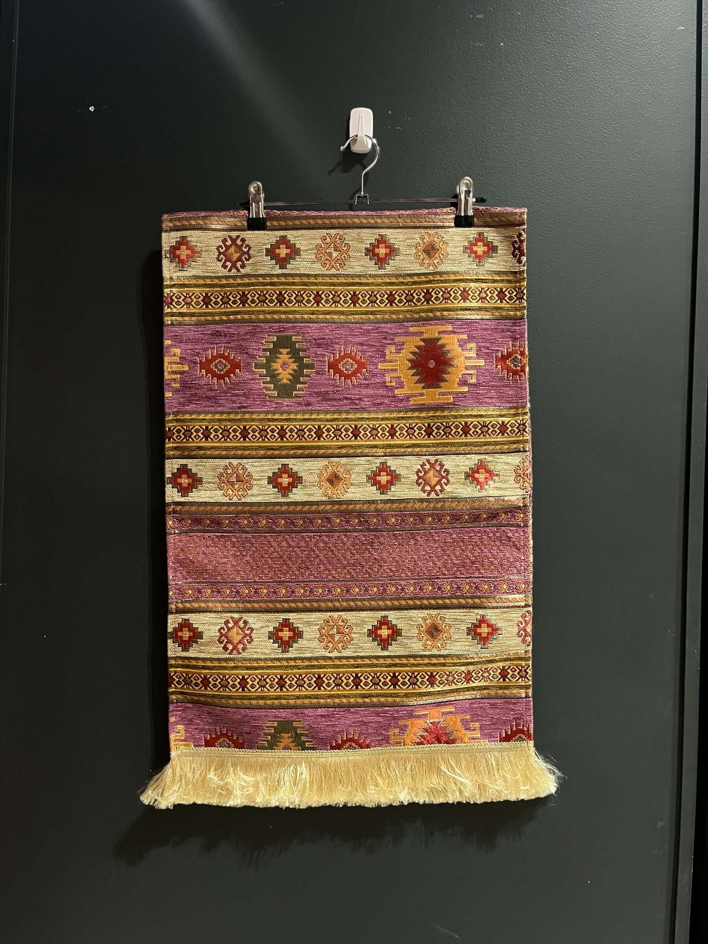 Turkish Table Runner Aztec Purple-Crafted from acrylic featuring a captivating blend of Tulip and Aztec designs, this table runner effortlessly adds a touch of cultural richness to any setting. Versatile and elegant, it's perfect for both casual and forma