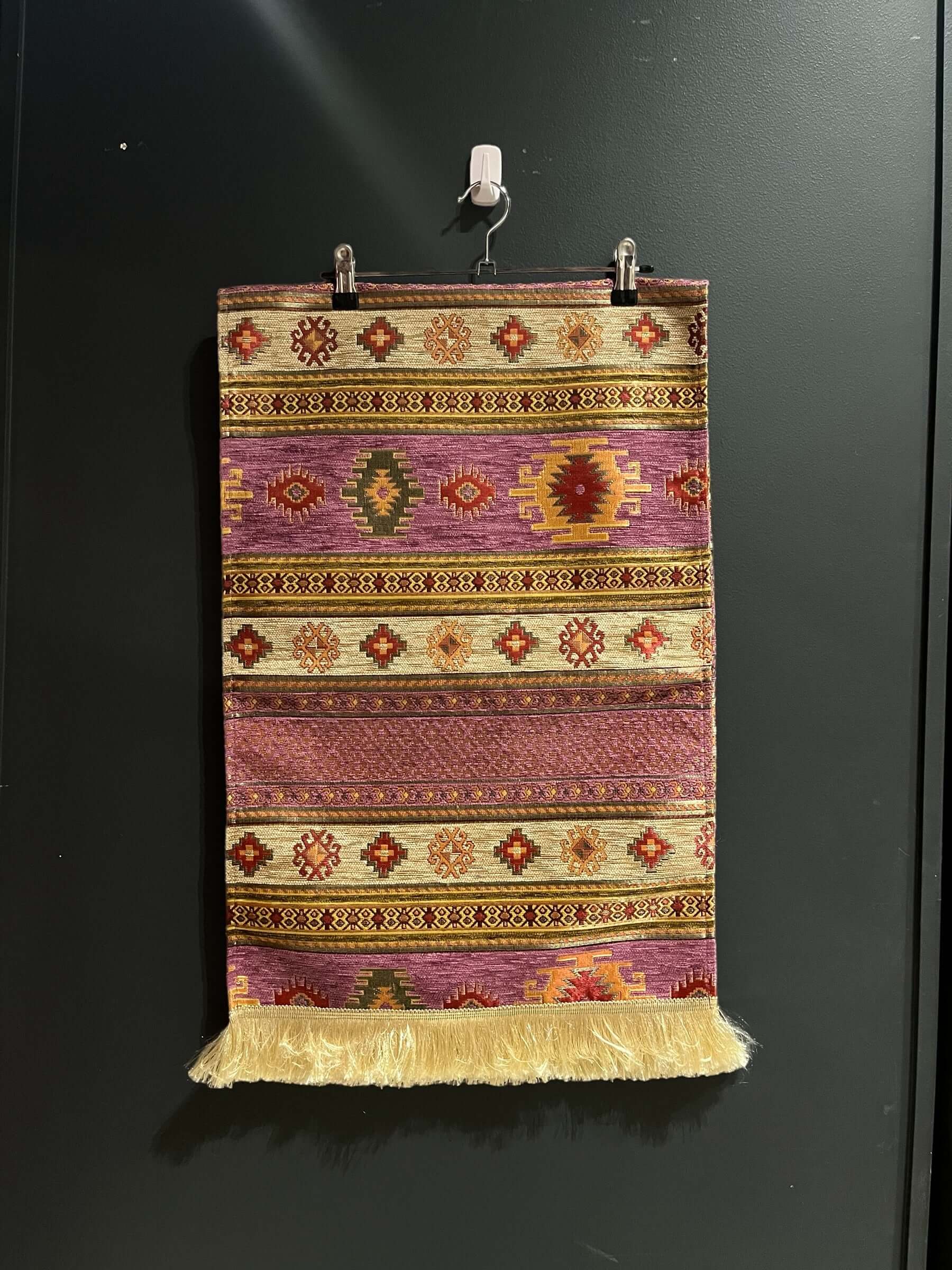 Turkish Table Runner Aztec Purple-Crafted from acrylic featuring a captivating blend of Tulip and Aztec designs, this table runner effortlessly adds a touch of cultural richness to any setting. Versatile and elegant, it's perfect for both casual and forma