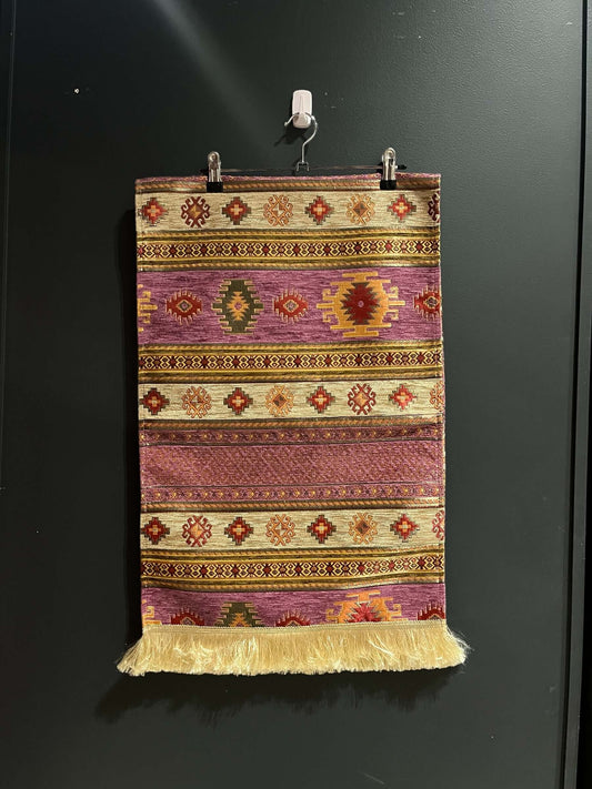Turkish Table Runner Aztec Purple-Crafted from acrylic featuring a captivating blend of Tulip and Aztec designs, this table runner effortlessly adds a touch of cultural richness to any setting. Versatile and elegant, it's perfect for both casual and forma