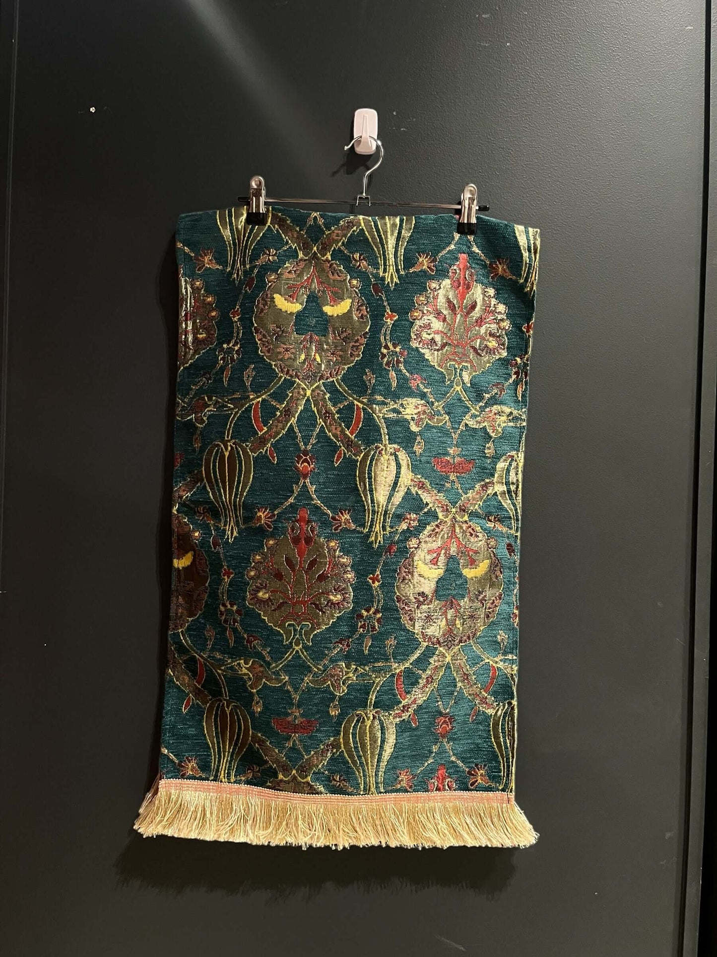 Turkish Table Runner Blue-Crafted from acrylic featuring a captivating blend of Tulip and Aztec designs, this table runner effortlessly adds a touch of cultural richness to any setting. Versatile and elegant, it's perfect for both casual and formal occasi