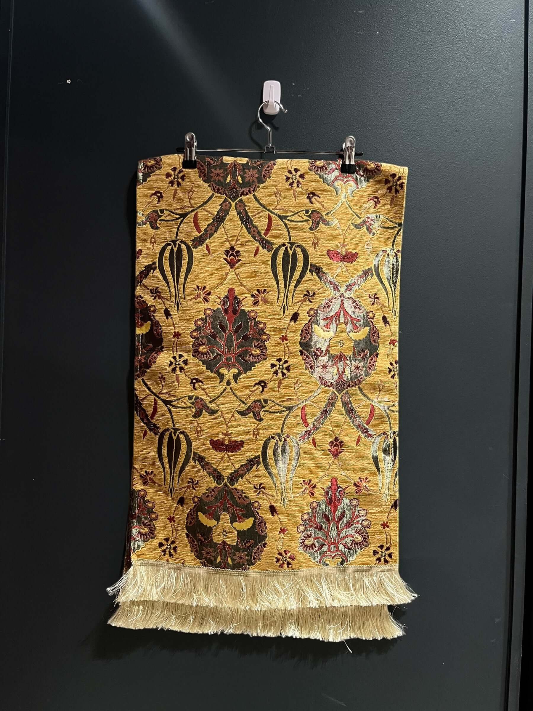 Turkish Table Runner Cream-Crafted from acrylic featuring a captivating blend of Tulip and Aztec designs, this table runner effortlessly adds a touch of cultural richness to any setting. Versatile and elegant, it's perfect for both casual and formal occas