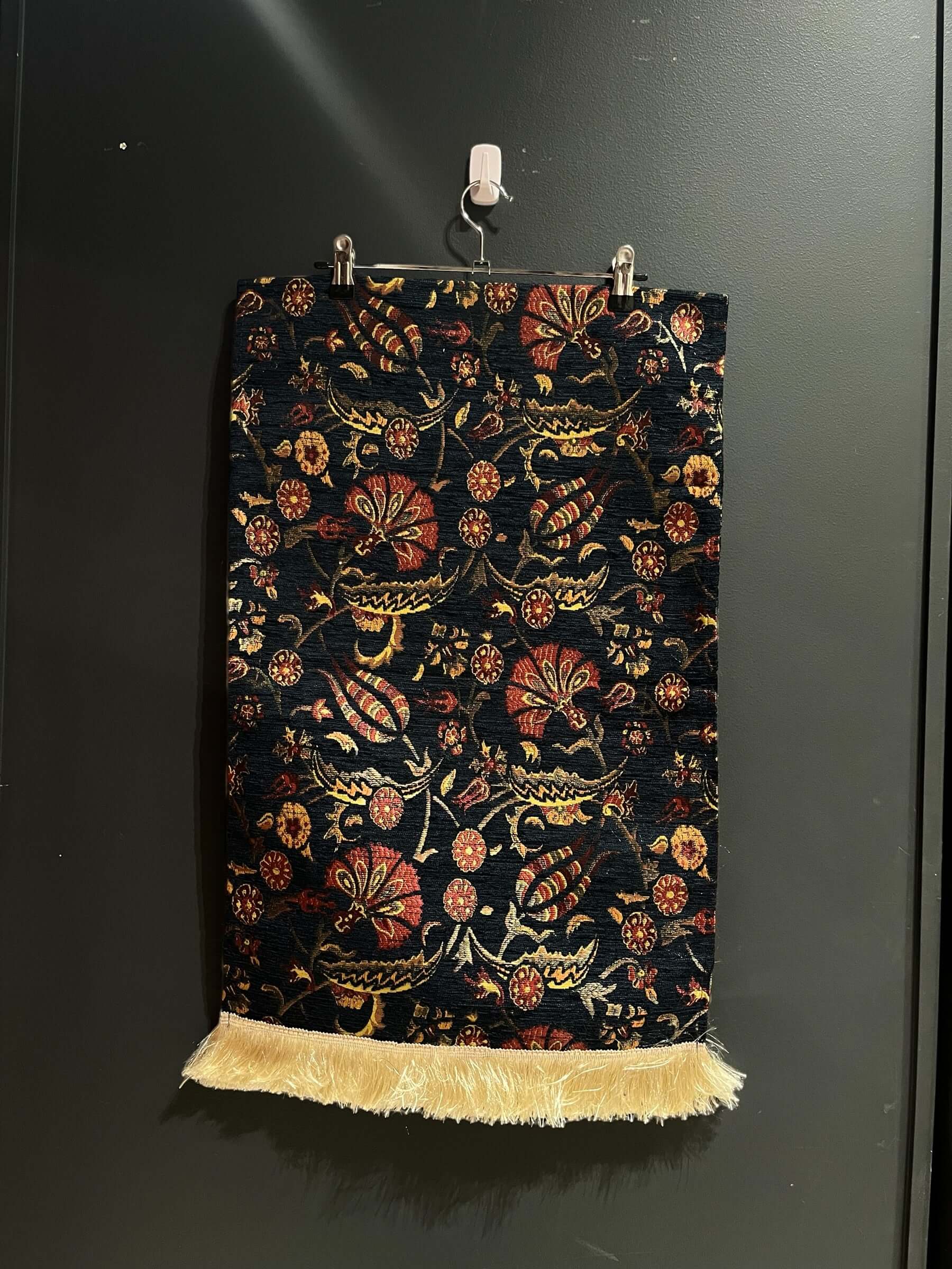 Turkish Table Runner Flowers Black-Crafted from acrylic featuring a captivating blend of Tulip and Aztec designs, this table runner effortlessly adds a touch of cultural richness to any setting. Versatile and elegant, it's perfect for both casual and form
