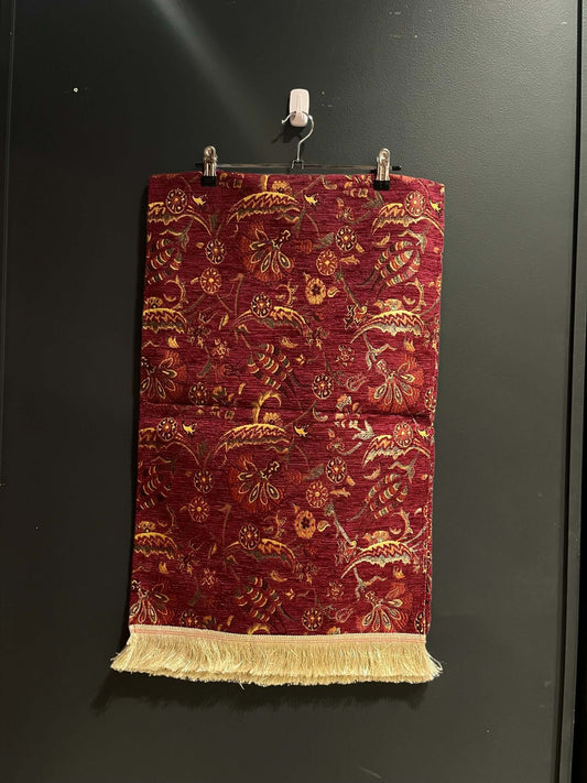 Turkish Table Runner Flowers Red-Crafted from acrylic featuring a captivating blend of Tulip and Aztec designs, this table runner effortlessly adds a touch of cultural richness to any setting. Versatile and elegant, it's perfect for both casual and formal