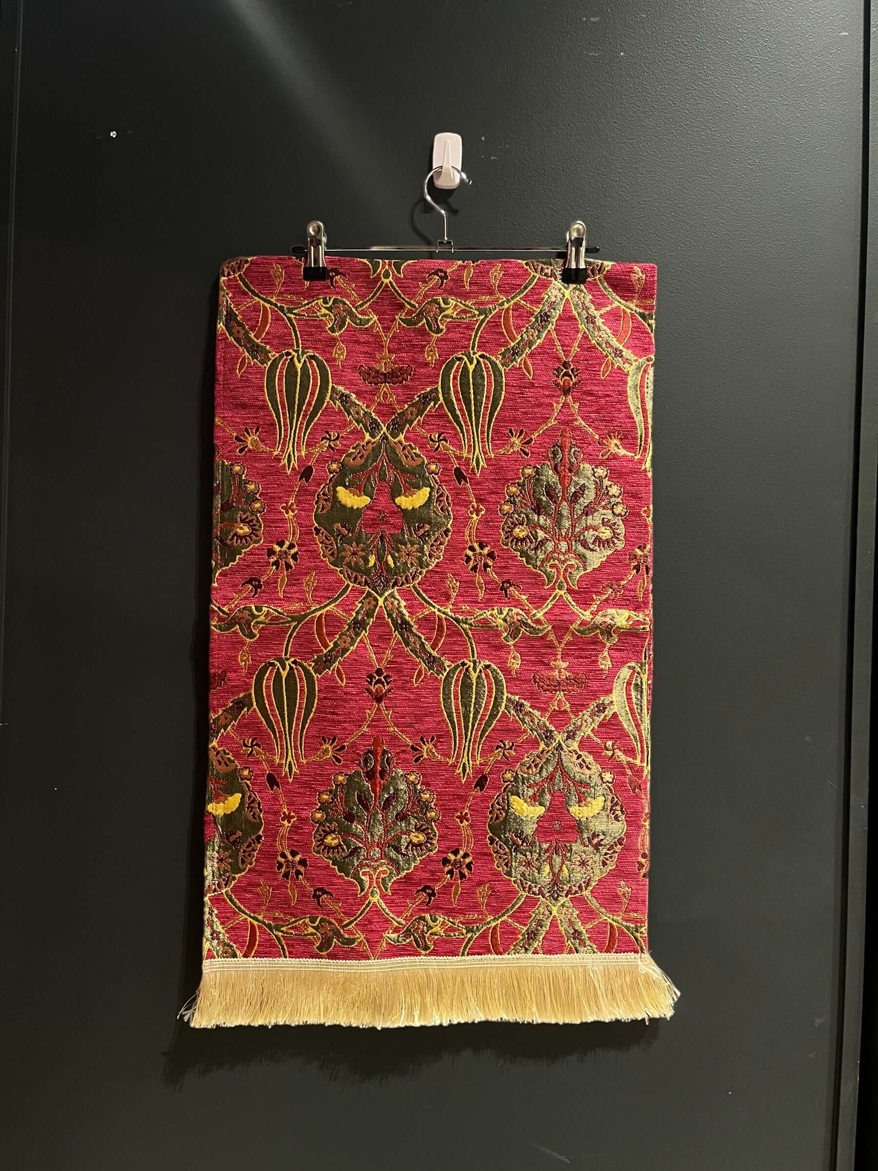 Turkish Table Runner Pink-Crafted from acrylic featuring a captivating blend of Tulip and Aztec designs, this table runner effortlessly adds a touch of cultural richness to any setting. Versatile and elegant, it's perfect for both casual and formal occasi