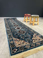 Turkish Traditional Hallway Runner Blue H4320A-Discover the perfect blend of tradition and modernity with our Turkish polyester rug. Featuring a rich blue background with intricate patterns, this durable, easy-to-maintain rug adds elegance to any space. I