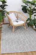 Vanuatu Totori Ash Geometric Flatweave Rug - 01 styled with furniture