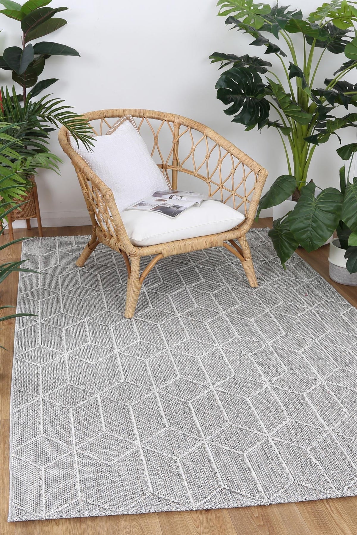 Vanuatu Totori Ash Geometric Flatweave Rug - 01 styled with furniture