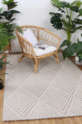 Vanuatu Onika Beige Geometric Flatweave Rug - 09 styled with furniture