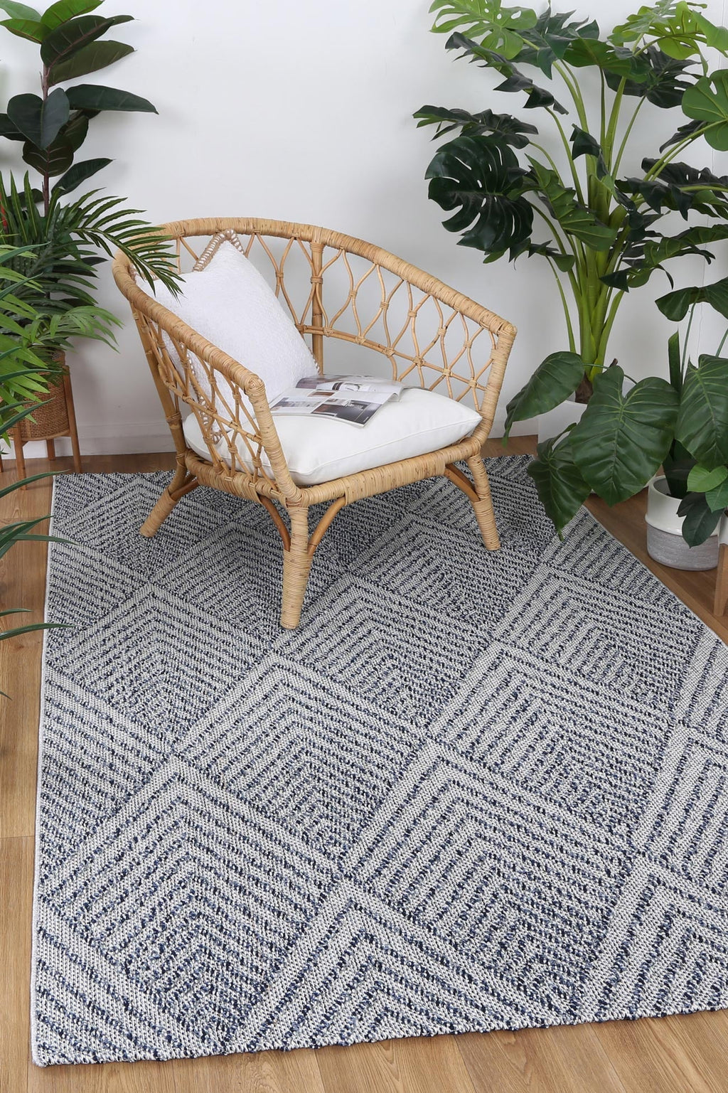Vanuatu Naka Charcoal Geometric Flatweave Rug - 10 styled with furniture