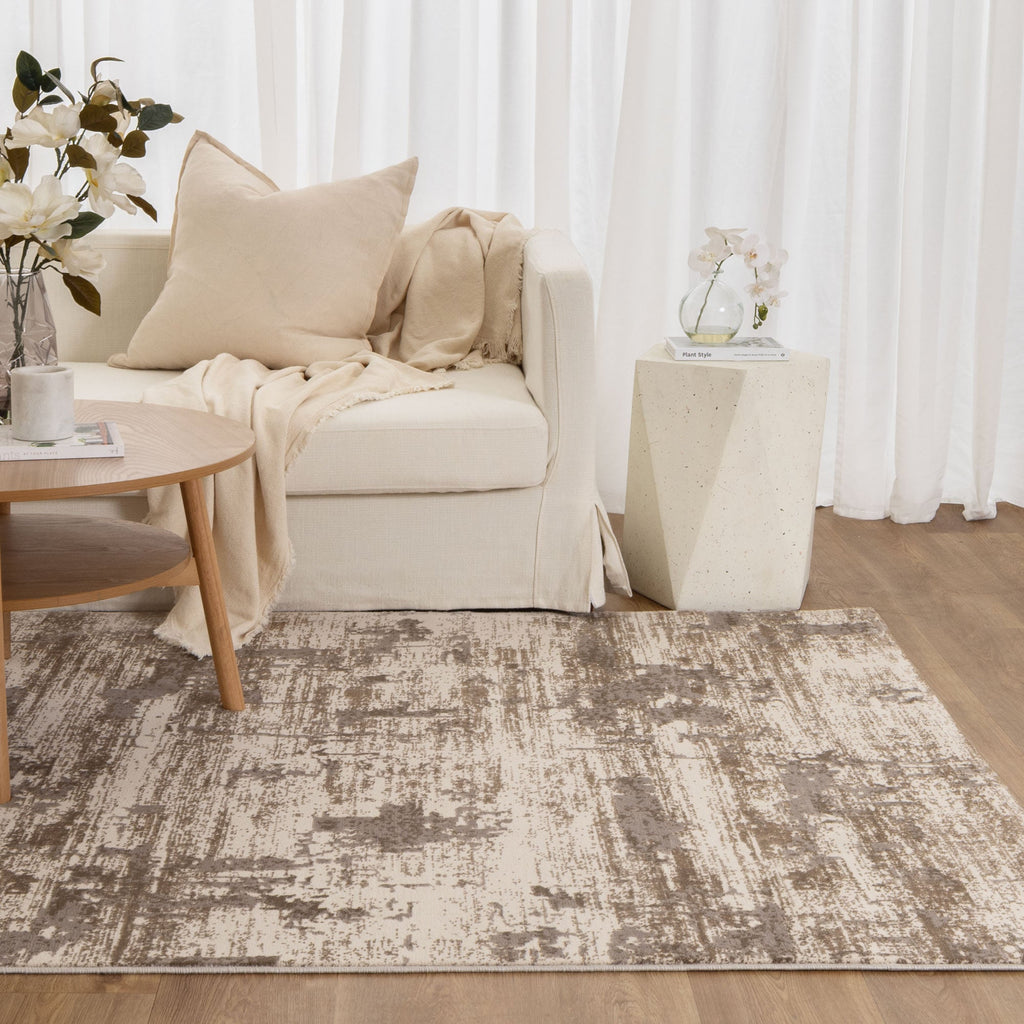 Pierre Cardin Whisper W006 Beige Brown Abstract Rug styled with furniture