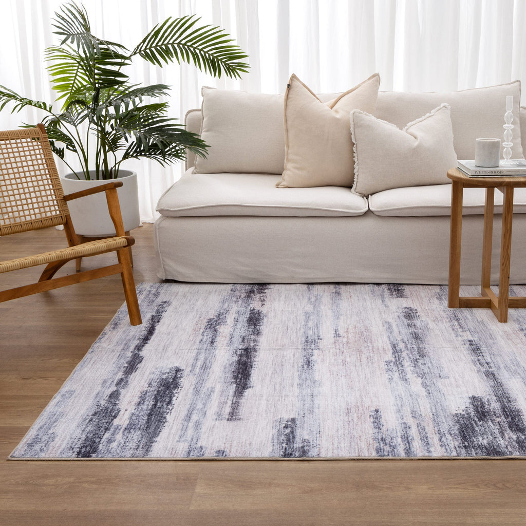 Washwell WASH006 Blue Abstract Washable Rug styled with furniture