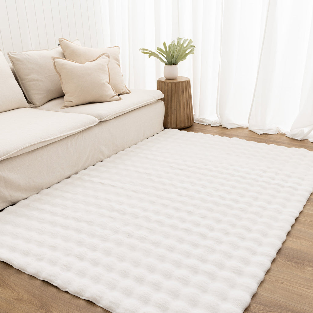 Purity Washable Rug White styled with furniture