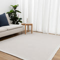 Coastal Living Checkers Border Cream Outdoor Rug - 2CRE — room or full rug view