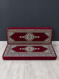 Maroon Palace double seater Arabic Majlis floor sofa against a charcoal wall