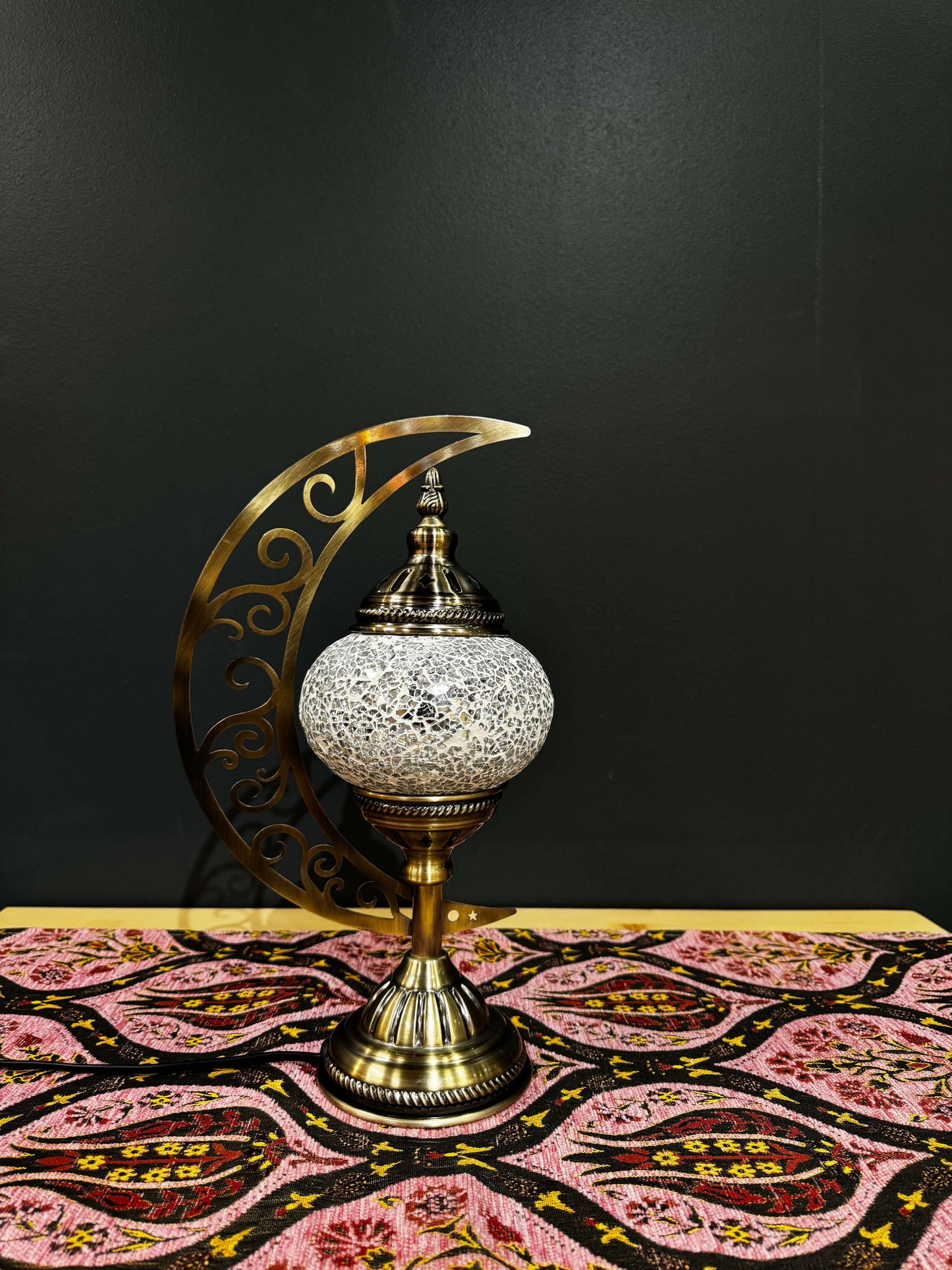 Golden Glow White Turkish Mosaic Lamp - Crescent Moon DesignShop the Golden Glow Turkish Mosaic Lamp! Features a golden and pearl mosaic design with a crescent moon stand. Includes LED bulb. Perfect for decor or gifting.