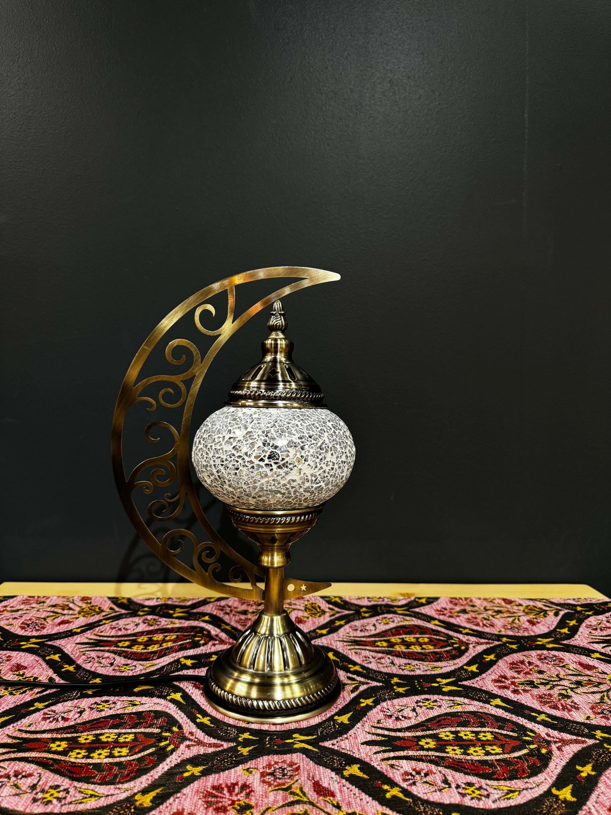 Golden Glow White Turkish Mosaic Lamp - Crescent Moon DesignShop the Golden Glow Turkish Mosaic Lamp! Features a golden and pearl mosaic design with a crescent moon stand. Includes LED bulb. Perfect for decor or gifting.