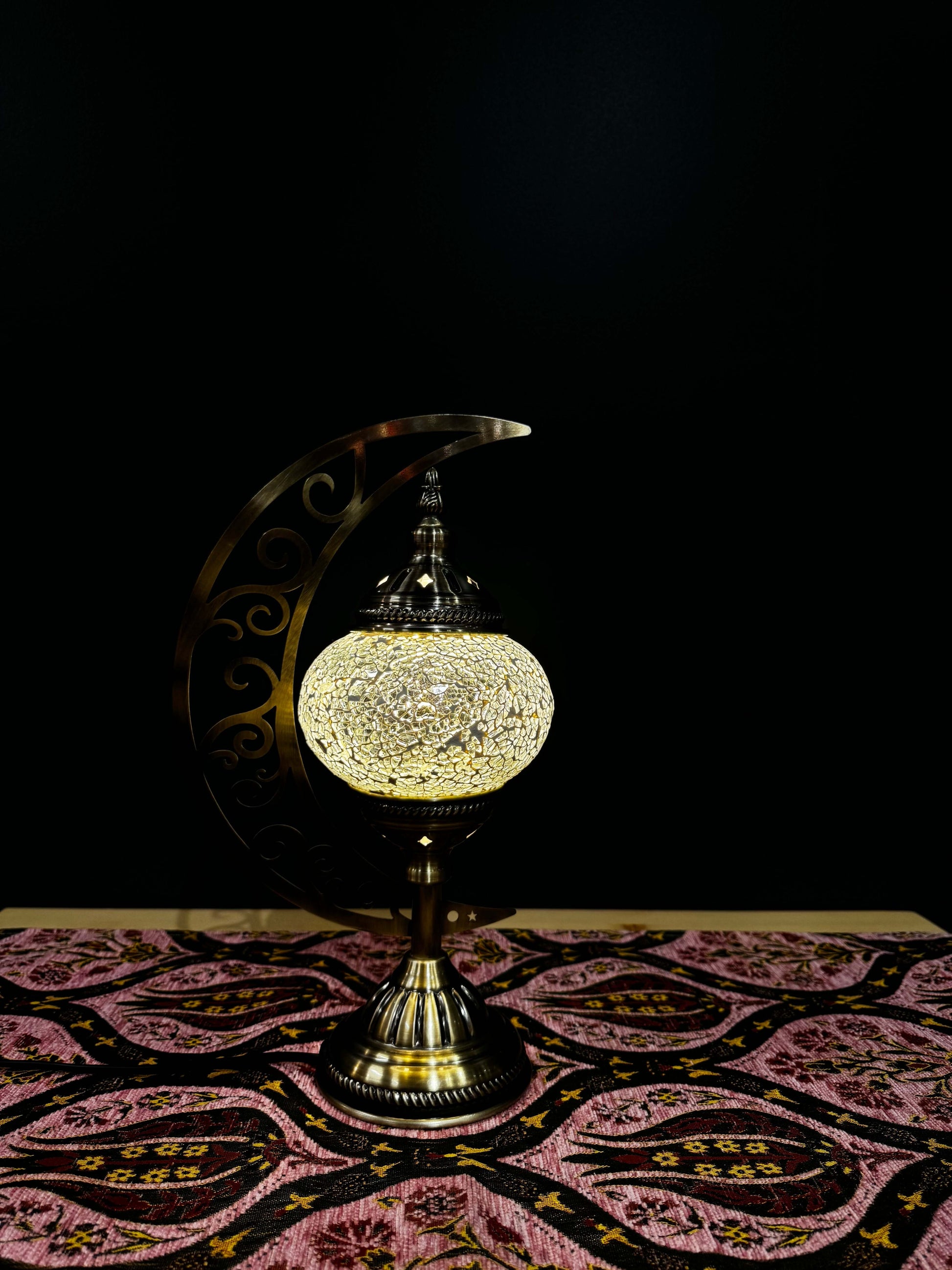 Golden Glow White Turkish Mosaic Lamp - Crescent Moon DesignShop the Golden Glow Turkish Mosaic Lamp! Features a golden and pearl mosaic design with a crescent moon stand. Includes LED bulb. Perfect for decor or gifting.