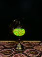 Emerald Glow Turkish Mosaic Lamp in crescent moon design with vibrant green and yellow floral mosaic on an ornate stand.