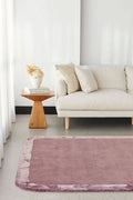 Orlo Grape Border Wool Rug - styled room