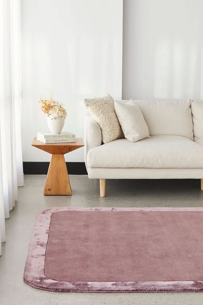 Orlo Grape Border Wool Rug - styled room