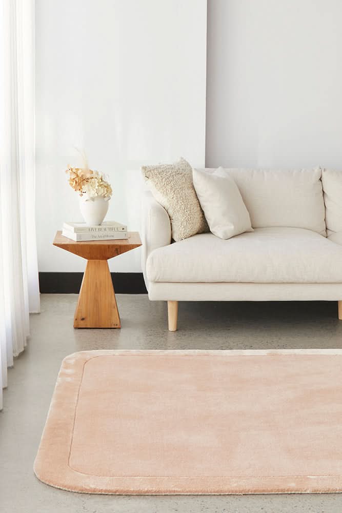 Orlo Nude Border Wool Rug - styled room