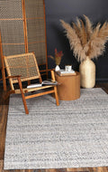 Salar Gunj Anthra wool rug - styled view