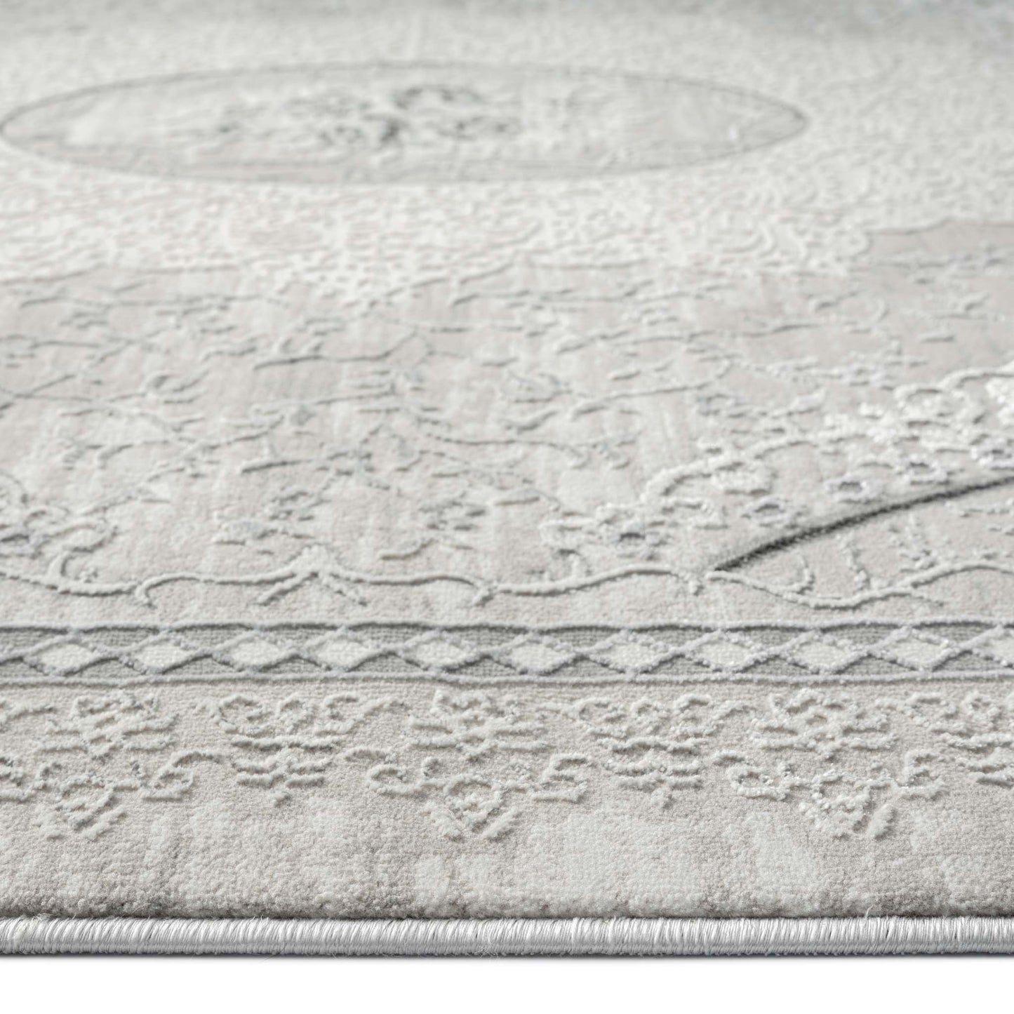 Classic Modern 4002 Grey Round-This exquisite collection is luxuriously crafted with a fine, soft pile made from polyester and polypropylene, and has a cotton base for extra comfort. The versatile designs in this elegant collection are woven into a multi-