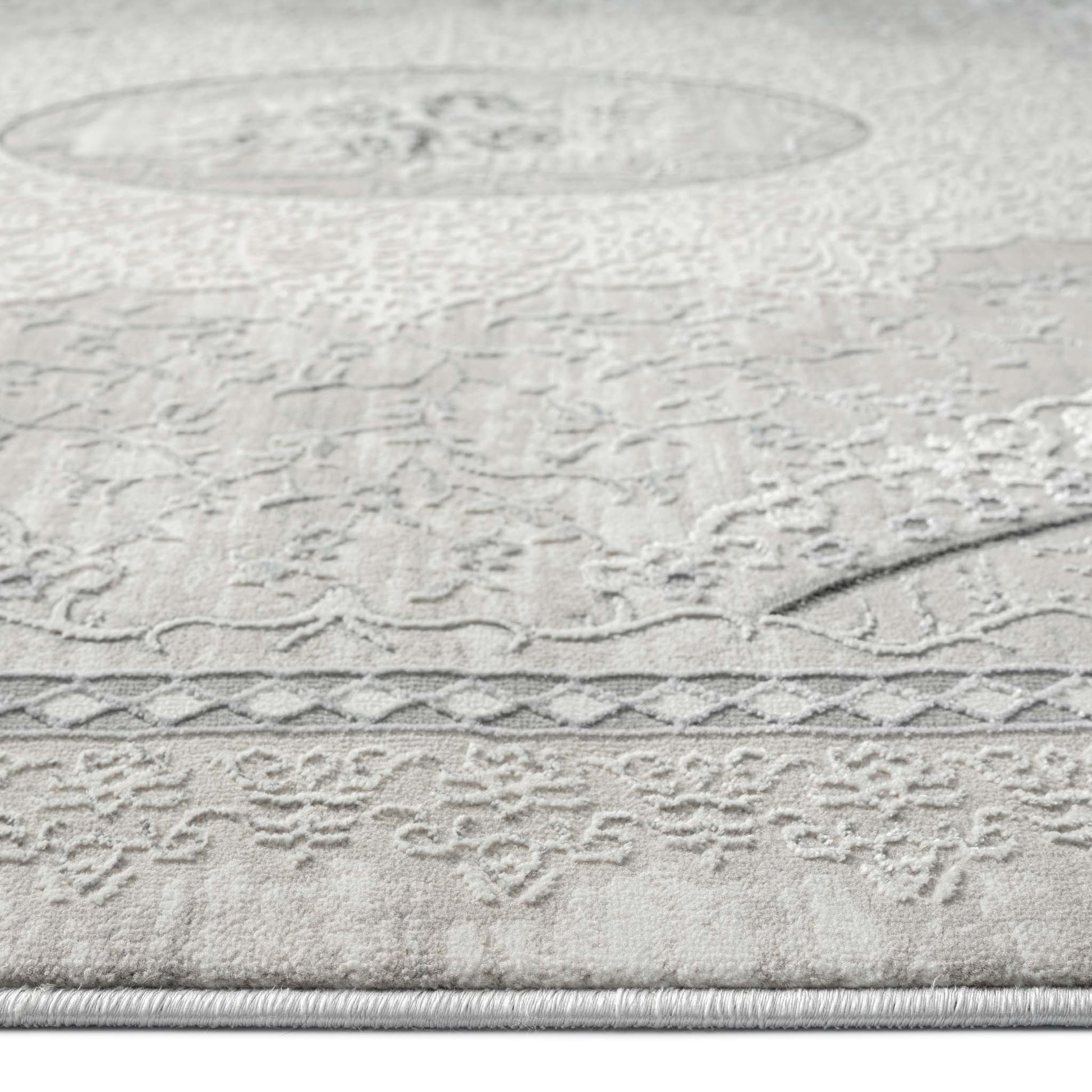 Classic Modern 4002 Grey Round-This exquisite collection is luxuriously crafted with a fine, soft pile made from polyester and polypropylene, and has a cotton base for extra comfort. The versatile designs in this elegant collection are woven into a multi-