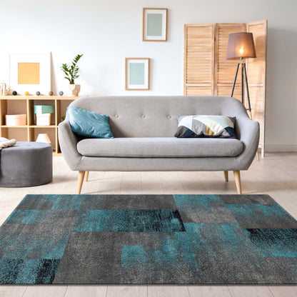 Geo Elegance 444 Blue-This thick and dense, heavy-duty collection has a durable construction and is power loomed in Turkey from heat-set polypropylene with shed-resistant and anti-static properties. Its modern, abstract designs are woven into stain-hiding