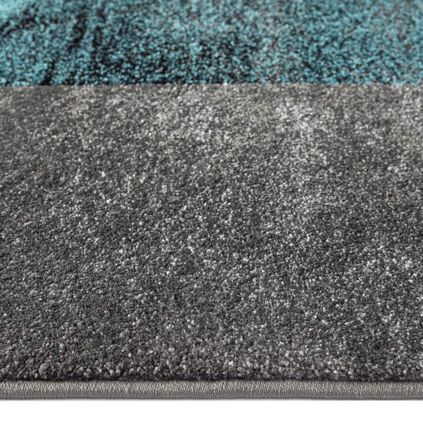 Geo Elegance 444 Blue-This thick and dense, heavy-duty collection has a durable construction and is power loomed in Turkey from heat-set polypropylene with shed-resistant and anti-static properties. Its modern, abstract designs are woven into stain-hiding