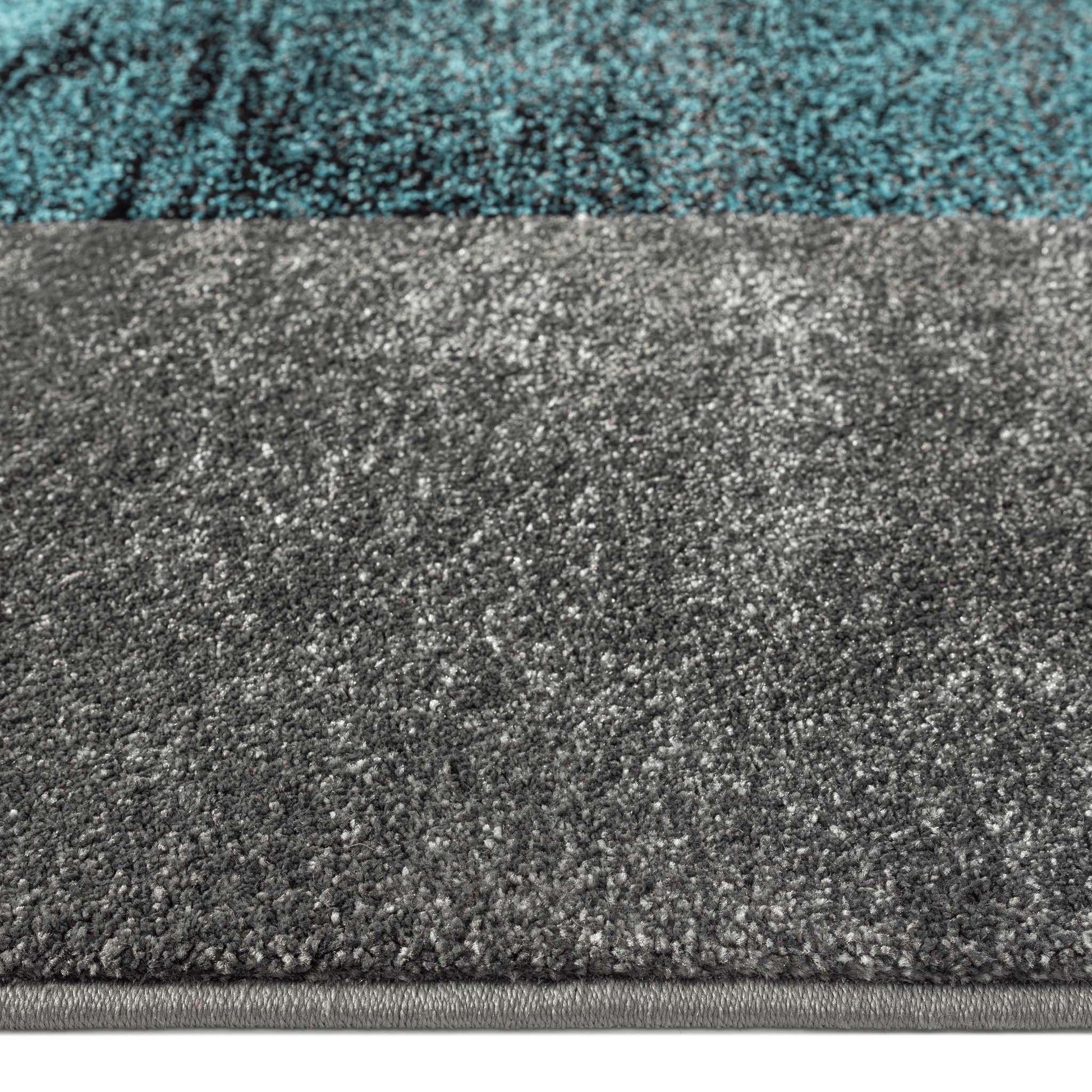 Geo Elegance 444 Blue-This thick and dense, heavy-duty collection has a durable construction and is power loomed in Turkey from heat-set polypropylene with shed-resistant and anti-static properties. Its modern, abstract designs are woven into stain-hiding