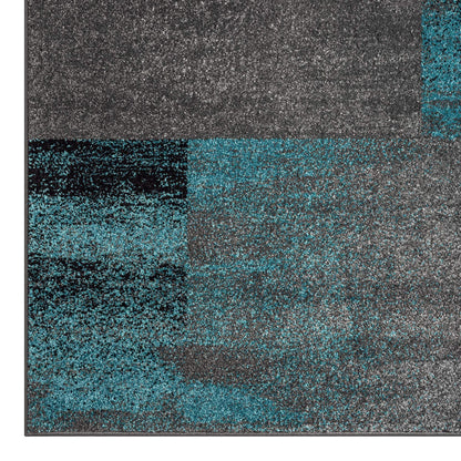 Geo Elegance 444 Blue-This thick and dense, heavy-duty collection has a durable construction and is power loomed in Turkey from heat-set polypropylene with shed-resistant and anti-static properties. Its modern, abstract designs are woven into stain-hiding