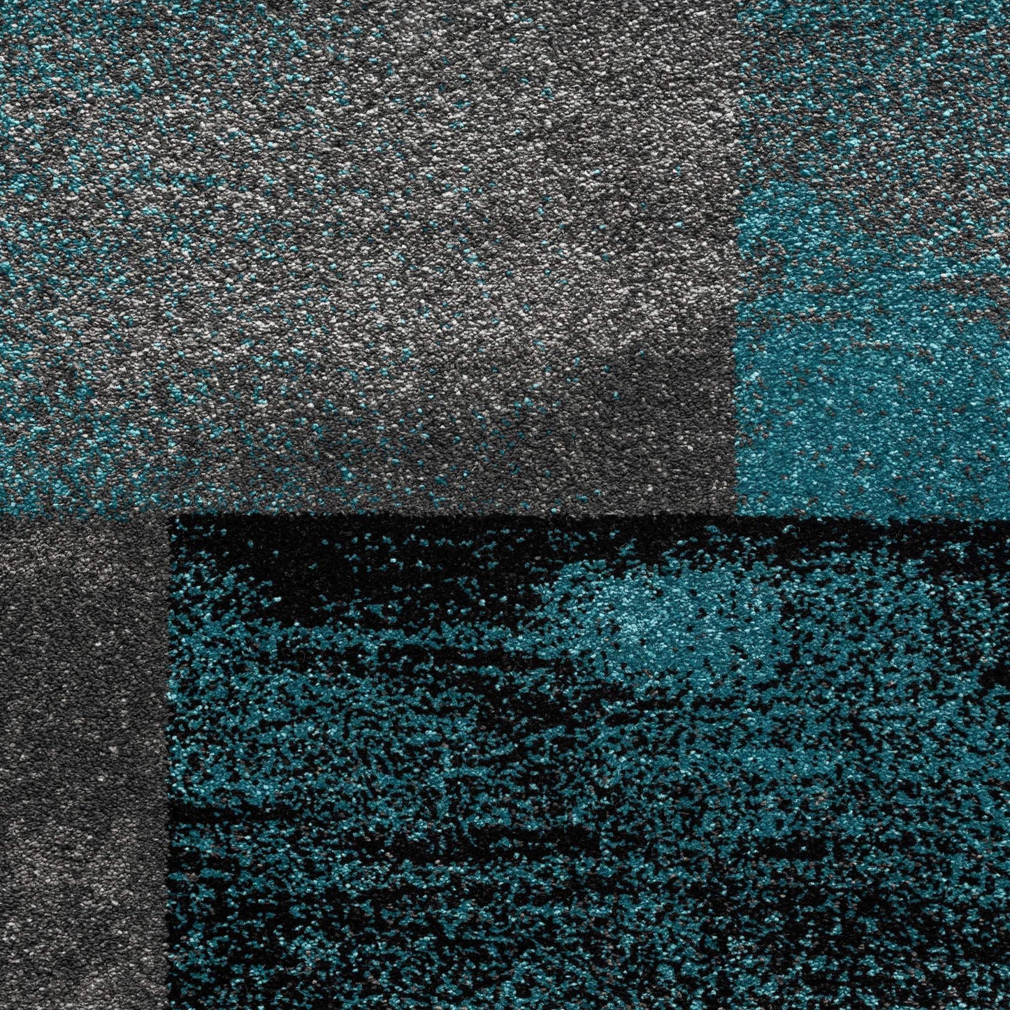 Geo Elegance 444 Blue-This thick and dense, heavy-duty collection has a durable construction and is power loomed in Turkey from heat-set polypropylene with shed-resistant and anti-static properties. Its modern, abstract designs are woven into stain-hiding