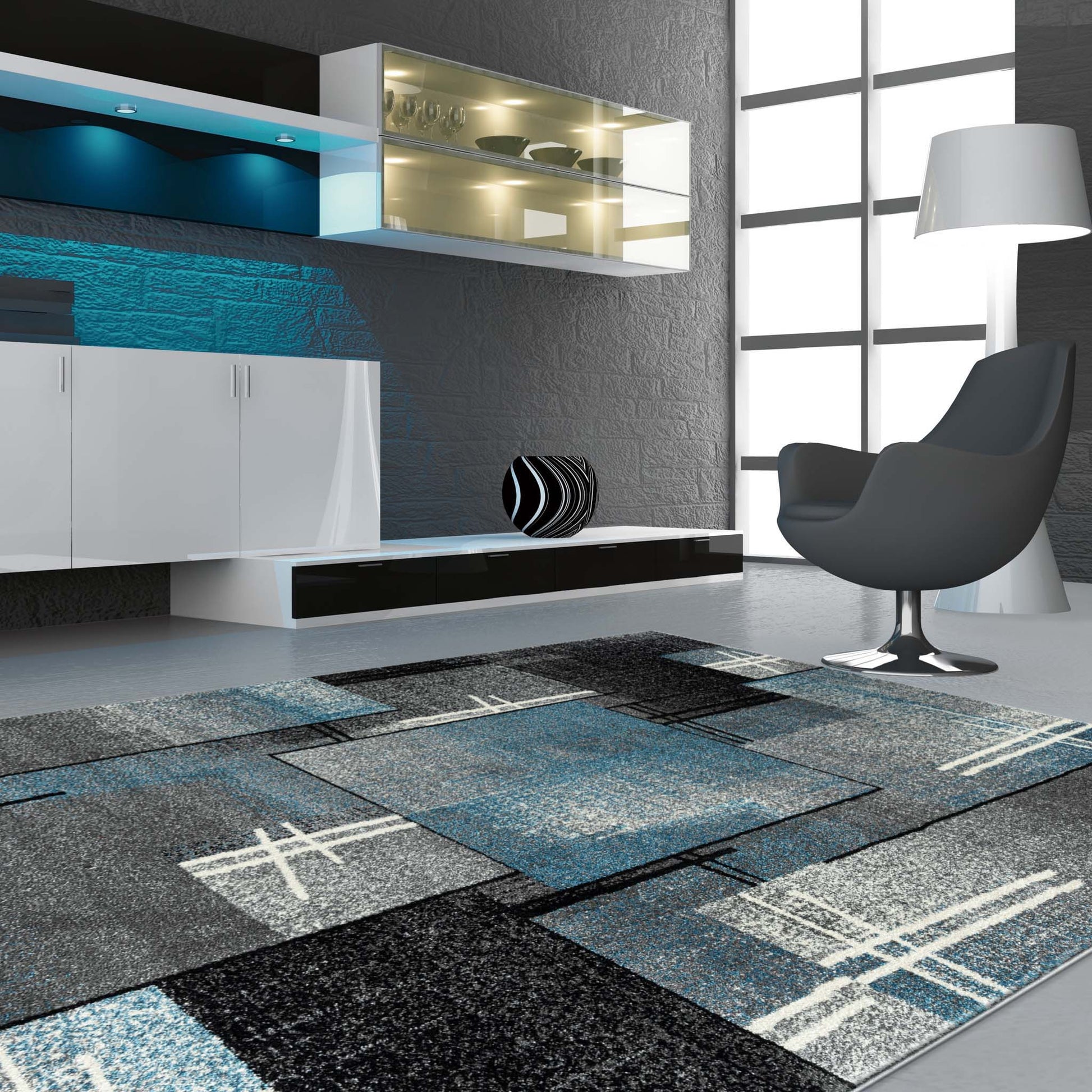 Geo Elegance 754 Blue-This thick and dense, heavy-duty collection has a durable construction and is power loomed in Turkey from heat-set polypropylene with shed-resistant and anti-static properties. Its modern, abstract designs are woven into stain-hiding