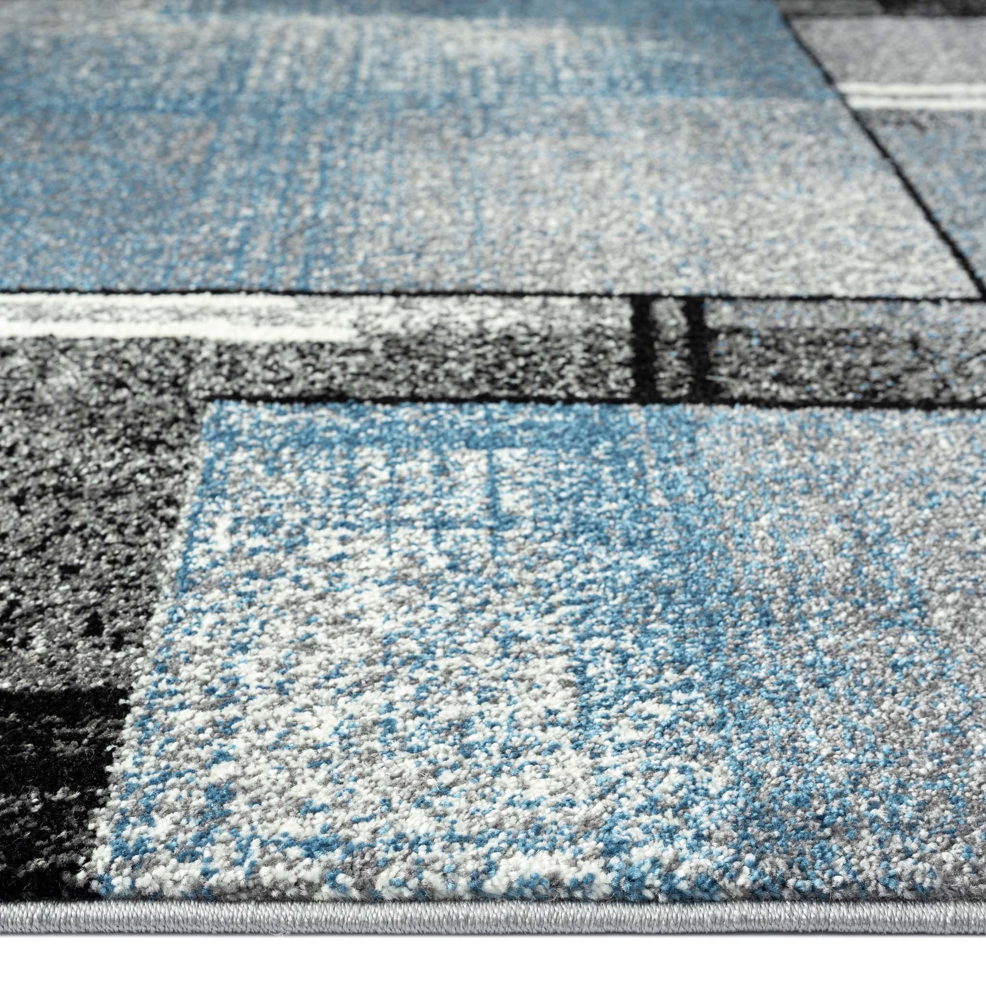 Geo Elegance 754 Blue-This thick and dense, heavy-duty collection has a durable construction and is power loomed in Turkey from heat-set polypropylene with shed-resistant and anti-static properties. Its modern, abstract designs are woven into stain-hiding