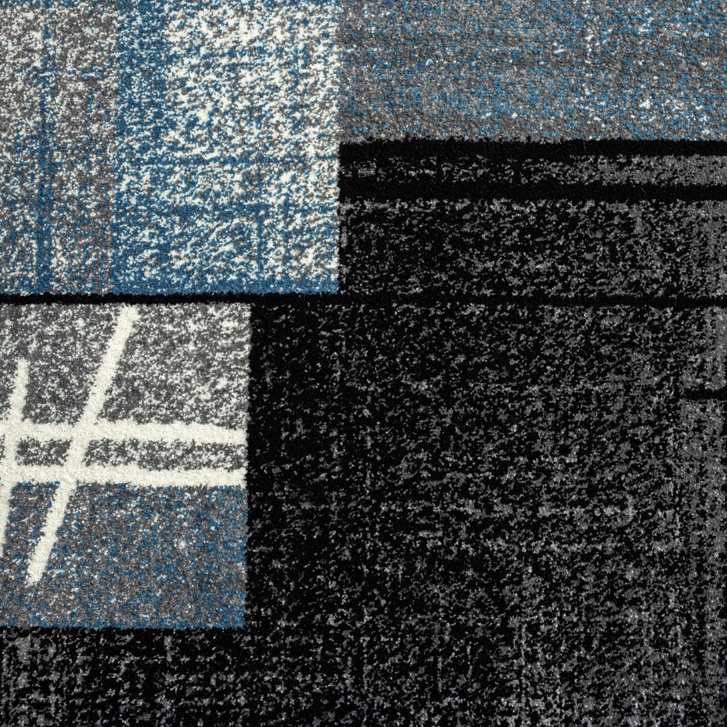 Geo Elegance 754 Blue-This thick and dense, heavy-duty collection has a durable construction and is power loomed in Turkey from heat-set polypropylene with shed-resistant and anti-static properties. Its modern, abstract designs are woven into stain-hiding