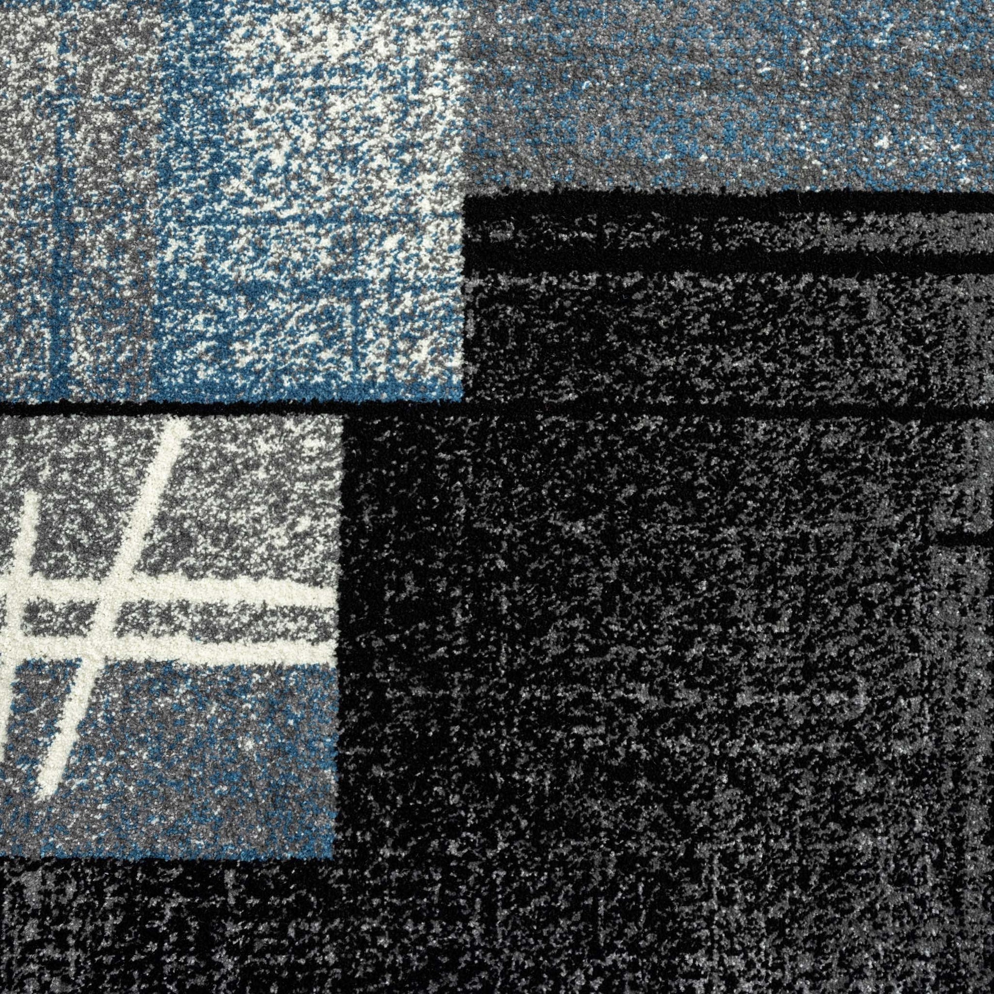 Geo Elegance 754 Blue-This thick and dense, heavy-duty collection has a durable construction and is power loomed in Turkey from heat-set polypropylene with shed-resistant and anti-static properties. Its modern, abstract designs are woven into stain-hiding