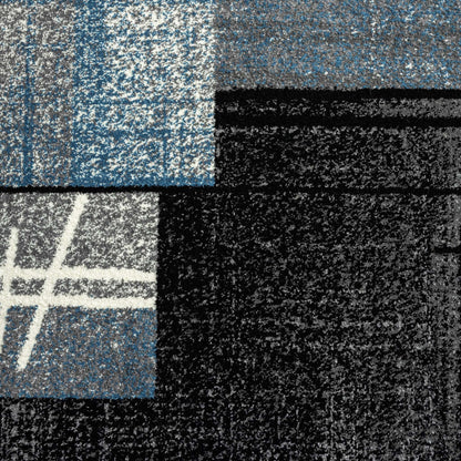 Geo Elegance 754 Blue-This thick and dense, heavy-duty collection has a durable construction and is power loomed in Turkey from heat-set polypropylene with shed-resistant and anti-static properties. Its modern, abstract designs are woven into stain-hiding