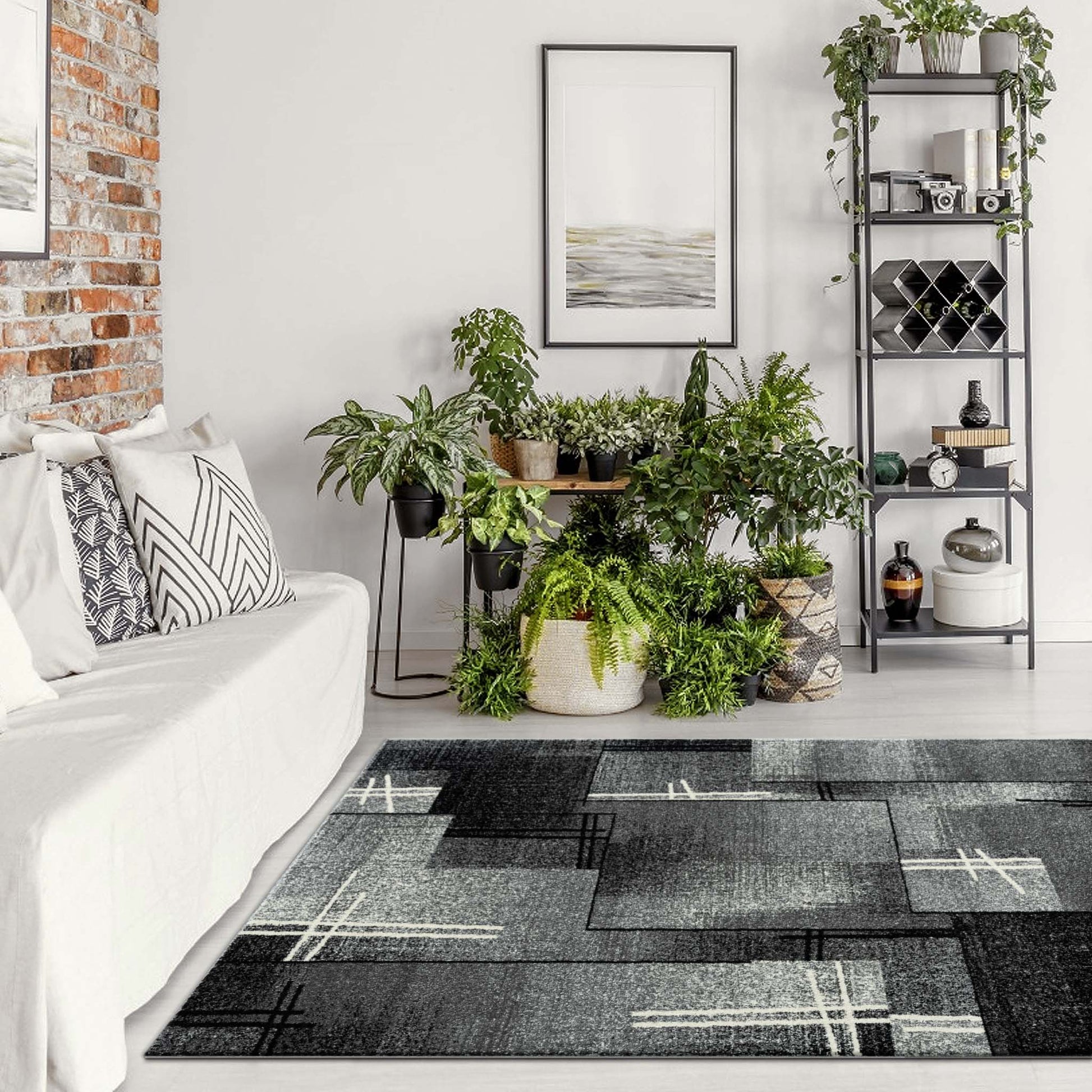 Geo Elegance 754 Grey-This thick and dense, heavy-duty collection has a durable construction and is power loomed in Turkey from heat-set polypropylene with shed-resistant and anti-static properties. Its modern, abstract designs are woven into stain-hiding