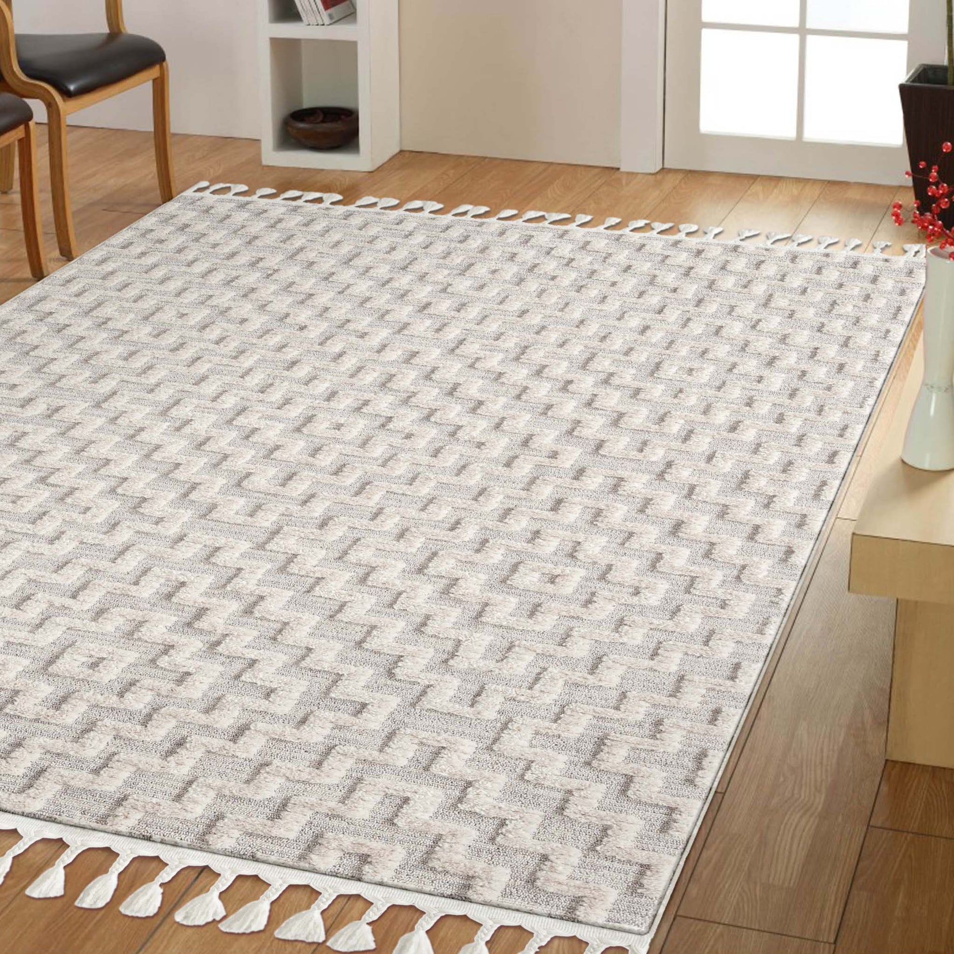 Soft Neutral 3631 Lt Grey-This attractive collection, with its subtle designs and geometric patterns is made from soft polyester, and has a high-and-low sculpted pile with up to 20 mm. thickness. The harmonious colour scheme used in this fashionable colle