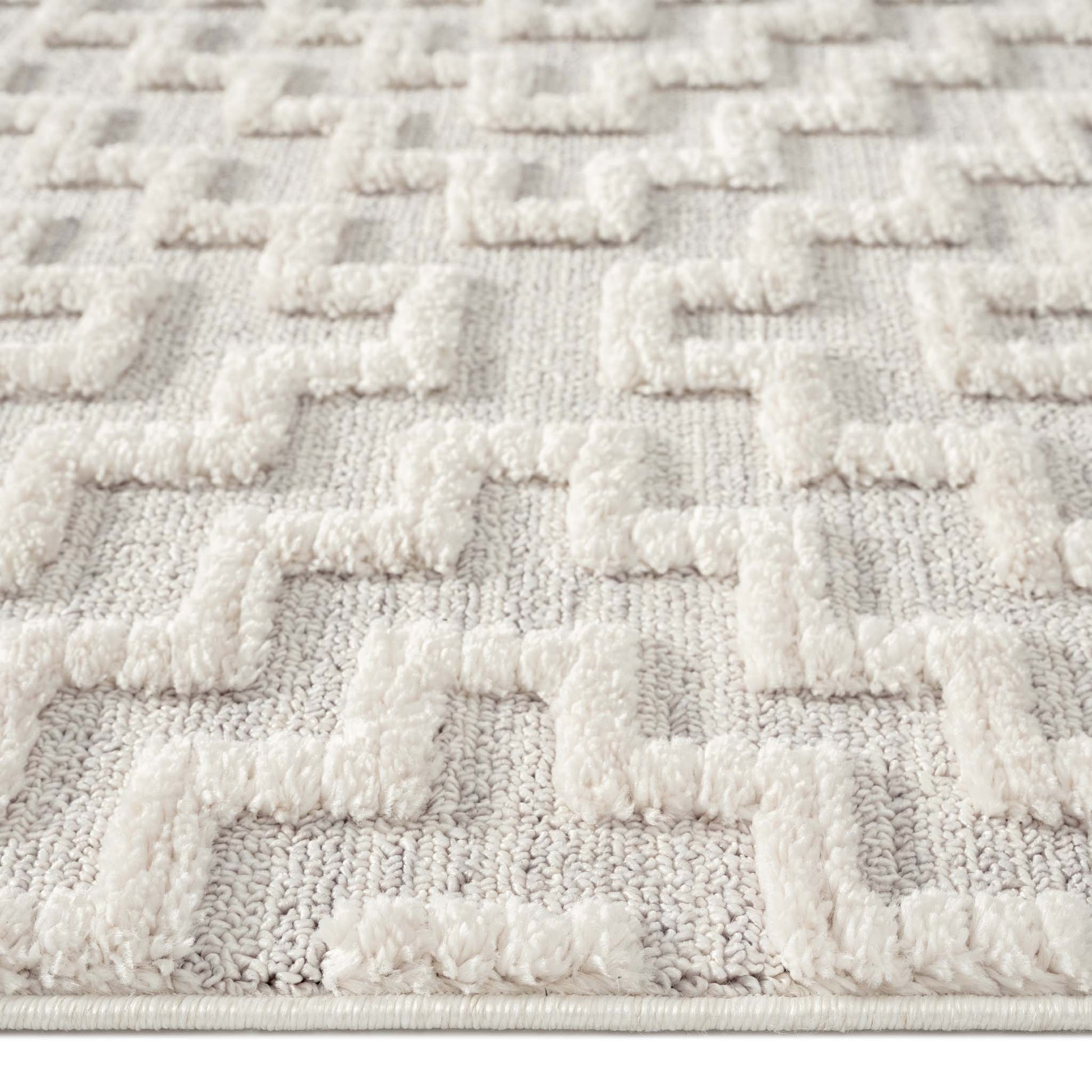 Soft Neutral 3631 Lt Grey-This attractive collection, with its subtle designs and geometric patterns is made from soft polyester, and has a high-and-low sculpted pile with up to 20 mm. thickness. The harmonious colour scheme used in this fashionable colle