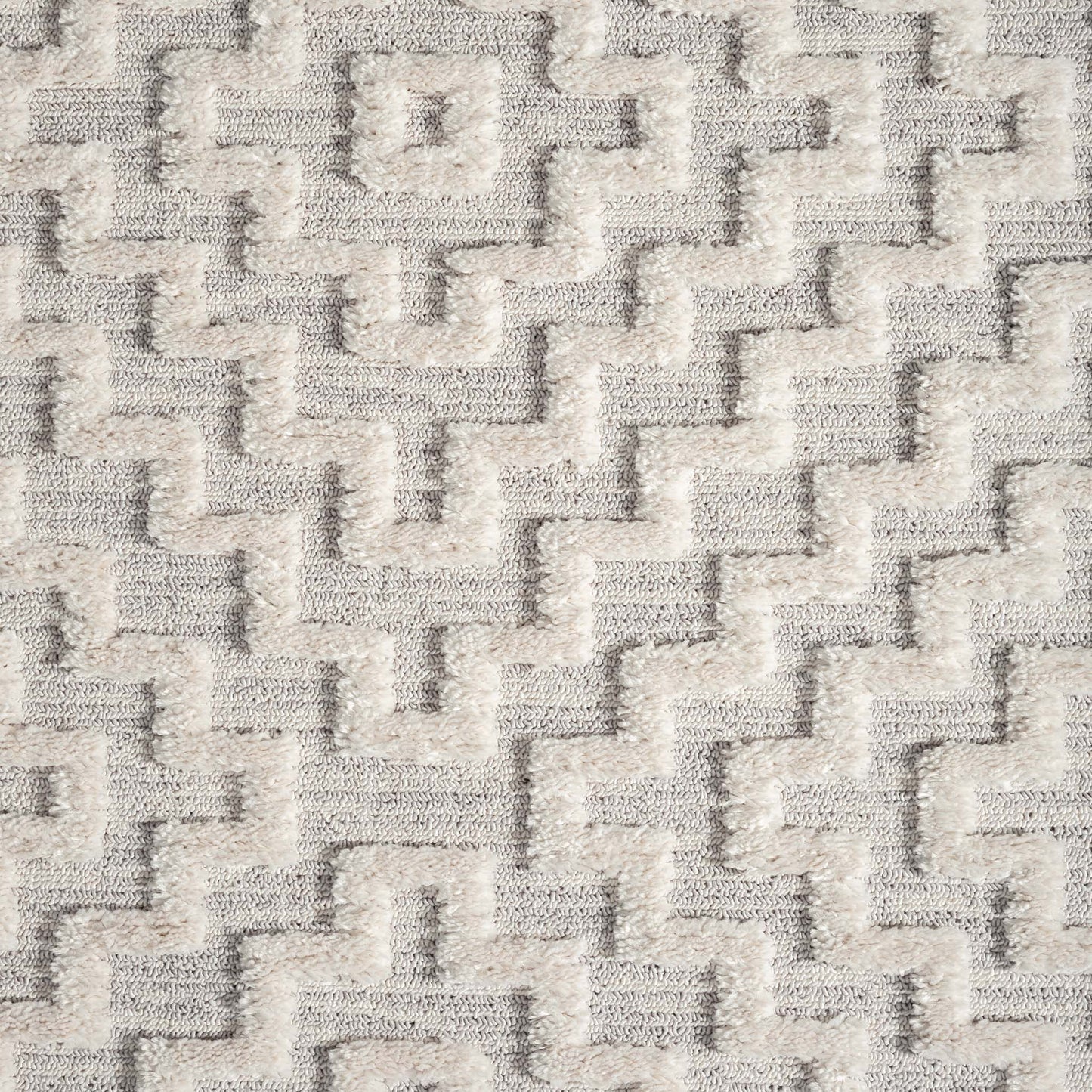 Soft Neutral 3631 Lt Grey-This attractive collection, with its subtle designs and geometric patterns is made from soft polyester, and has a high-and-low sculpted pile with up to 20 mm. thickness. The harmonious colour scheme used in this fashionable colle