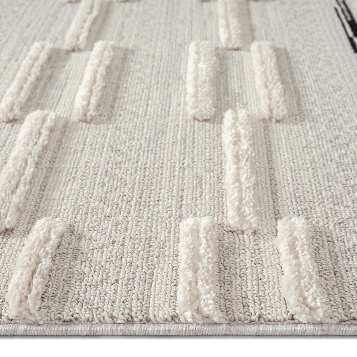Soft Neutral 3634 Grey-This attractive collection, with its subtle designs and geometric patterns is made from soft polyester, and has a high-and-low sculpted pile with up to 20 mm. thickness. The harmonious colour scheme used in this fashionable collecti