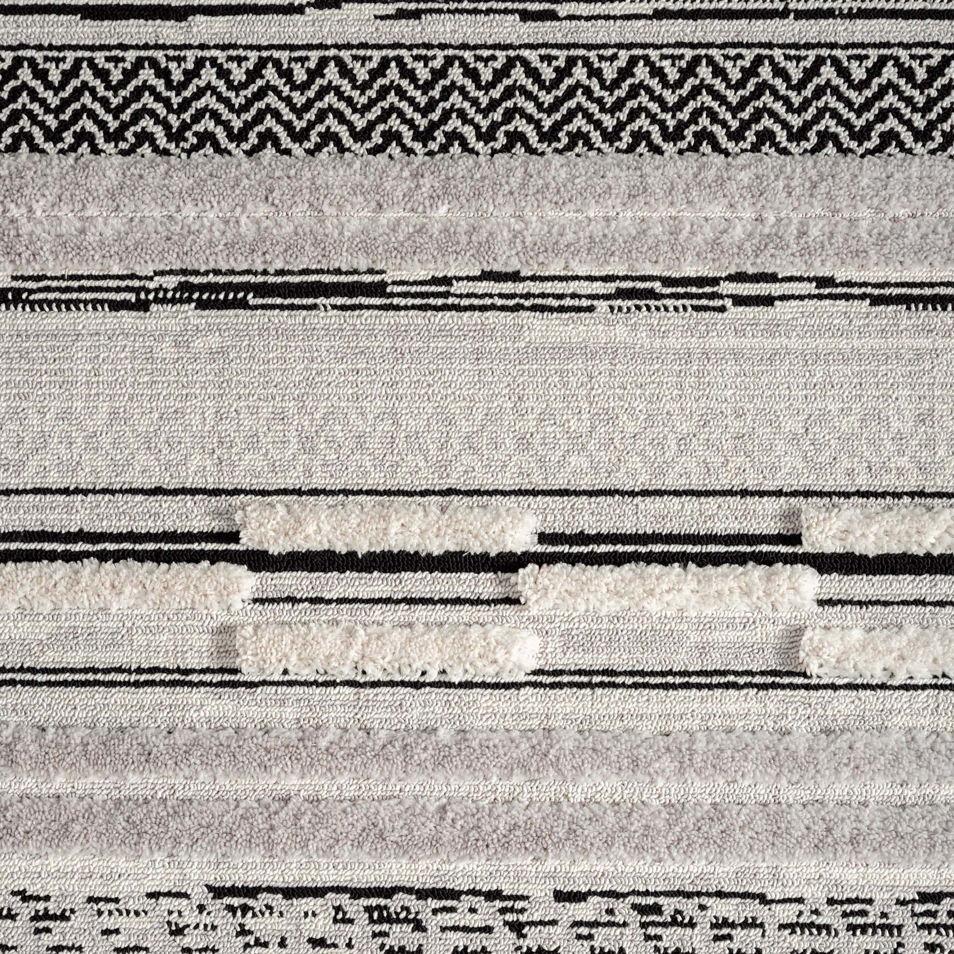 Soft Neutral 3634 Grey-This attractive collection, with its subtle designs and geometric patterns is made from soft polyester, and has a high-and-low sculpted pile with up to 20 mm. thickness. The harmonious colour scheme used in this fashionable collecti